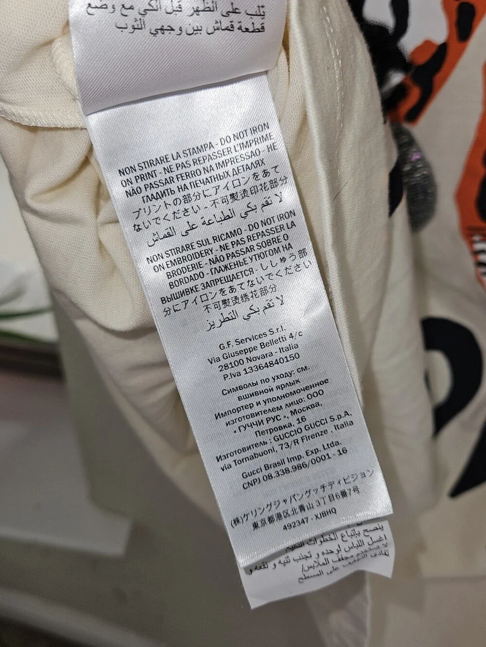 Gucci Cream Tee with Bold Orange Tiger Graphic